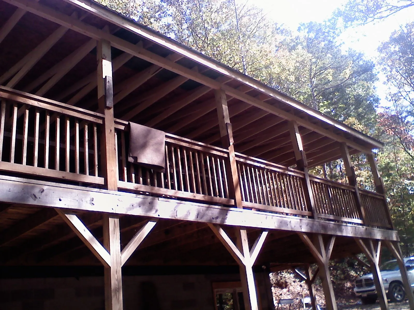 Timber framing under a new elevated porch and deck — Roof Leak Repair in Walled Lake by Roofing Brothers